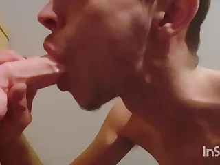 Gay Twink Joe Nuts giving his new dildo a blowjob